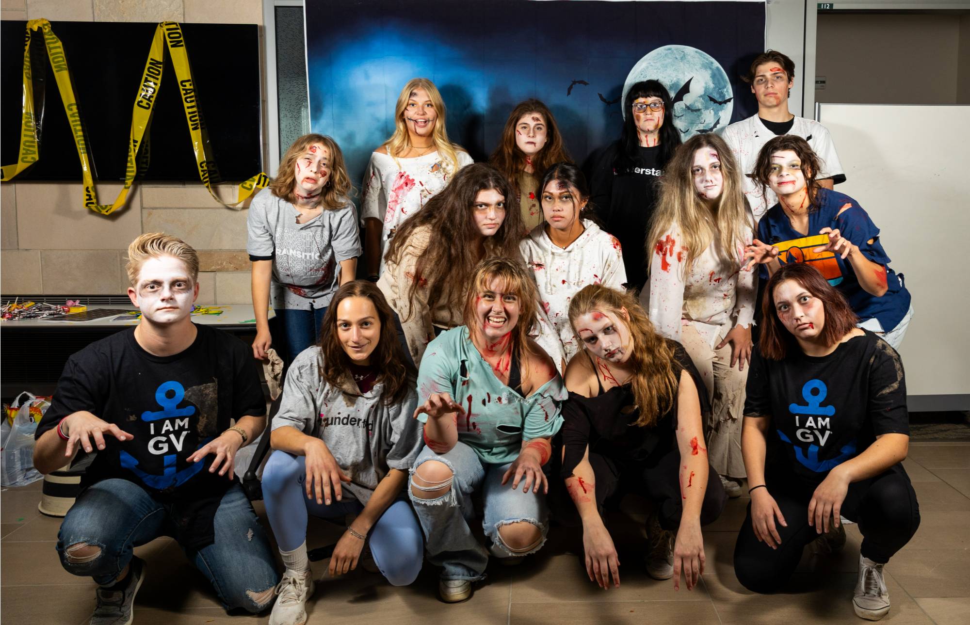 Students dressed up as zombies posing for a group photo